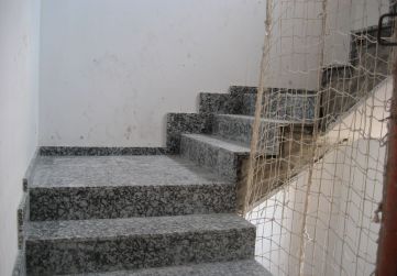 Peldañeado granito escalera portal 4 